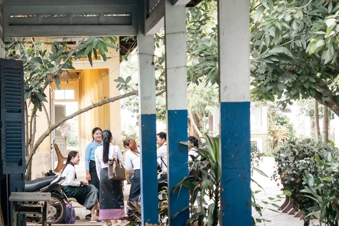 Chhern Lisa chatting with fellow teachers at Athipadei Primary School, Puok District. Credit: UNESCO/Yuan Xu